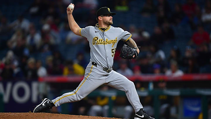 Apr 22, 2025; Anaheim, California, USA; Pittsburgh Pirates pitcher Chase Shugart (55) throws against the Los Angeles Angels during the fifth inning at Angel Stadium. Mandatory Credit: Gary A. Vasquez-Imagn Images