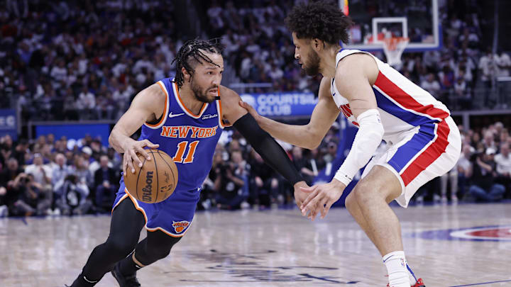 May 1, 2025; Detroit, Michigan, USA; New York Knicks guard Jalen Brunson (11) dribbles on Detroit Pistons guard Cade Cunningham (2) in the first half during game six of first round for the 2024 NBA Playoffs at Little Caesars Arena. Mandatory Credit: Rick Osentoski-Imagn Images