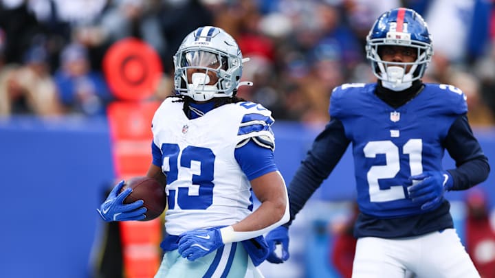 Dallas Cowboys running back Jaydon Blue celebrates after scoring a touchdown during the first quarter against the New York Giants at MetLife Stadium.