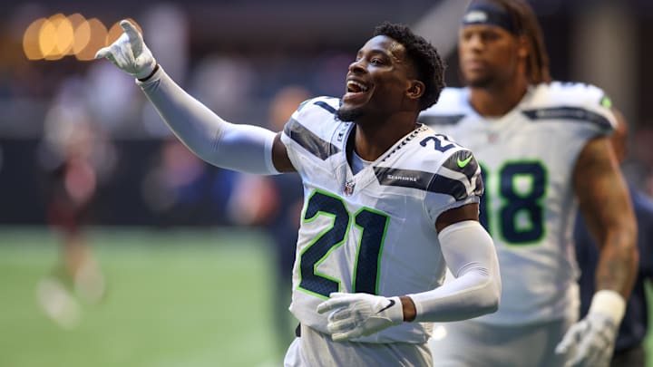 Oct 20, 2024; Atlanta, Georgia, USA; Seattle Seahawks cornerback Devon Witherspoon (21) runs off the field before a game against the Atlanta Falcons at Mercedes-Benz Stadium. Oct 20, 2024; Atlanta, Georgia, USA; Seattle Seahawks cornerback Devon Witherspoon (21) runs off the field before a game against the Atlanta Falcons at Mercedes-Benz Stadium.