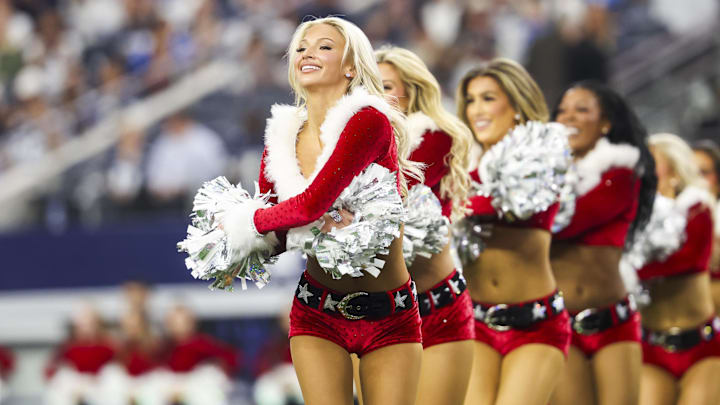 Dallas Cowboys cheerleaders perform during halftime of a game against the Los Angeles Chargers at AT&T Stadium. Dallas Cowboys cheerleaders perform during halftime of a game against the Los Angeles Chargers at AT&T Stadium.