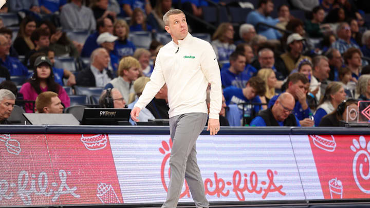 West Virginia is hiring North Texas' Ross Hodge as next head basketball coach.