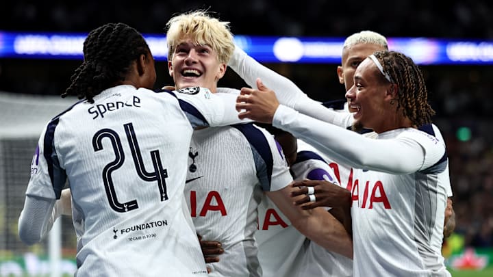 Spurs celebrate their fortuitous winner.
