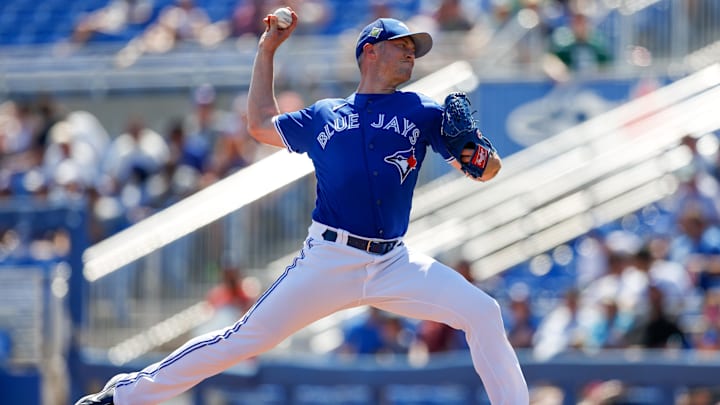 Mar 22, 2022; Dunedin, Florida, USA; Toronto Blue Jays relief pitcher Trevor Richards (33) throws a