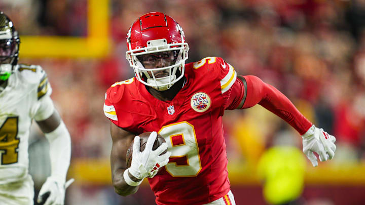Oct 7, 2024; Kansas City, Missouri, USA; Kansas City Chiefs wide receiver JuJu Smith-Schuster (9) runs with the ball during the first half against the New Orleans Saints at GEHA Field at Arrowhead Stadium. Mandatory Credit: Jay Biggerstaff-Imagn Images