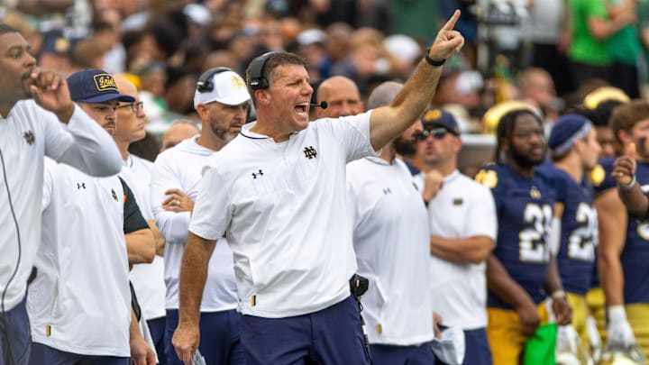 Sep 20, 2025; South Bend, Indiana, USA; Notre Dame Fighting Irish defensive coordinator Chris Ash shouts towards the field against the Purdue Boilermakers during the first half at Notre Dame Stadium. Mandatory Credit: Michael Caterina-Imagn Images