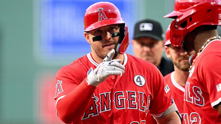 Jun 2, 2025; Boston, Massachusetts, USA; Los Angeles Angels outfielder Mike Trout (27) reacts after hitting a three-run home run against the Boston Red Sox during the first inning at Fenway Park. Mandatory Credit: Brian Fluharty-Imagn Images