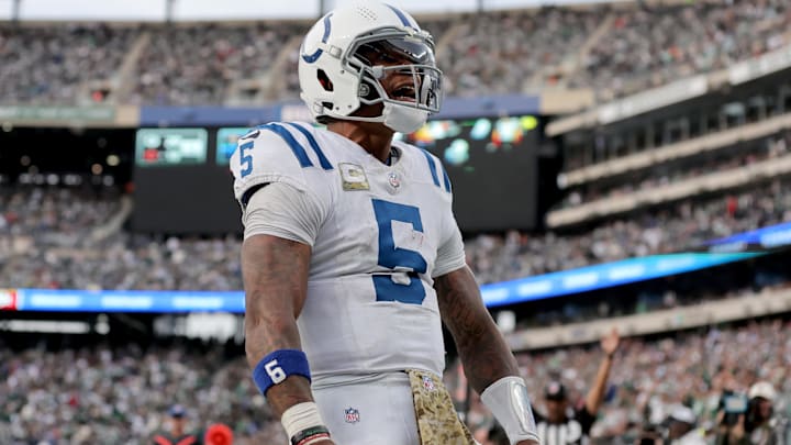Nov 17, 2024; East Rutherford, New Jersey, USA; Indianapolis Colts quarterback Anthony Richardson (5) celebrates his touchdown against the New York Jets during the fourth quarter at MetLife Stadium. Mandatory Credit: Brad Penner-Imagn Images