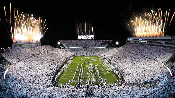 Fireworks burst over Beaver Stadium as the Penn State Nittany Lions take the field prior to a White Out game against the Washington Huskies.