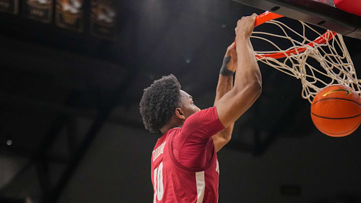 Feb 19, 2025; Columbia, Missouri, USA; Alabama Crimson Tide forward Mouhamed Dioubate (10) dunks the ball against the Missouri Tigers during the second half at Mizzou Arena. Mandatory Credit: Denny Medley-Imagn Images