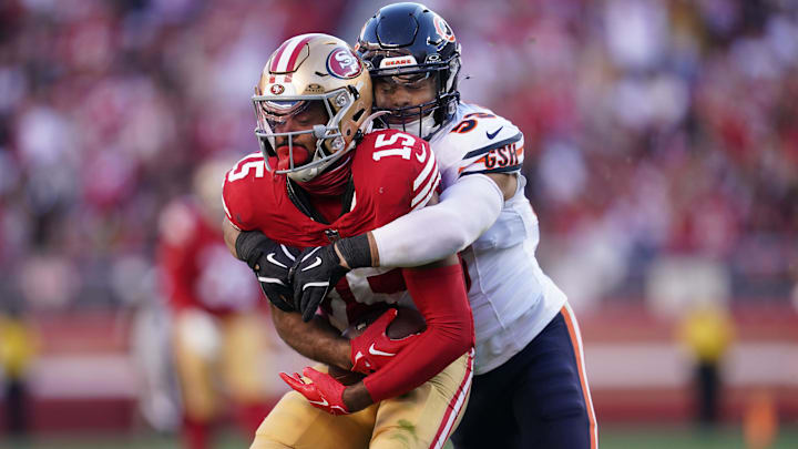 Bears linebacker T.J. Edwards wraps up 49ers receiver Jauan Jennings in last year's game on the coast. They match up again in Week 17 in 2025, same location.