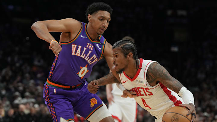 Mar 30, 2025; Phoenix, Arizona, USA; Houston Rockets guard Jalen Green (4) drives on Phoenix Suns forward Ryan Dunn (0) in the first half at Footprint Center. Mandatory Credit: Rick Scuteri-Imagn Images Mar 30, 2025; Phoenix, Arizona, USA; Houston Rockets guard Jalen Green (4) drives on Phoenix Suns forward Ryan Dunn (0) in the first half at Footprint Center. Mandatory Credit: Rick Scuteri-Imagn Images