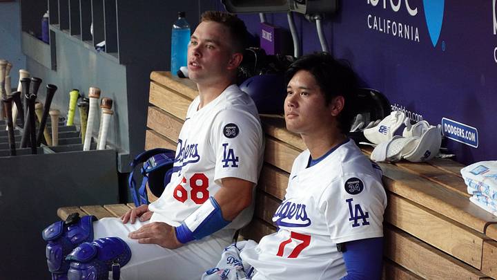 Aug 27, 2025; Los Angeles, California, USA; Los Angeles Dodgers catcher Dalton Rushing (68) and starting pitcher Shohei Ohtani (17) watch from the dugout during the game against the Cincinnati Reds at Dodger Stadium. Mandatory Credit: Kirby Lee-Imagn Images                               