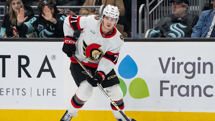 Dec 17, 2024; Seattle, Washington, USA;  Ottawa Senators forward Ridly Greig (71) skates with the puck against the Seattle Kraken at Climate Pledge Arena. Mandatory Credit: Stephen Brashear-Imagn Images