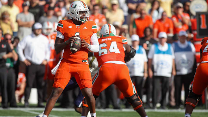 Miami Hurricanes quarterback Cam Ward drops back to pass against the Georgia Tech Yellow Jackets.