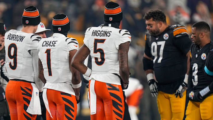 Cincinnati Bengals wide receiver Ja'Marr Chase (1), quarterback Joe Burrow (9) and wide receiver Tee Higgins (5) take the field as captains for the coin toss before the first quarter of the NFL Week 18 game between the Pittsburgh Steelers and the Cincinnati Bengals at Acrisure Stadium in Pittsburgh on Saturday, Jan. 4, 2025.