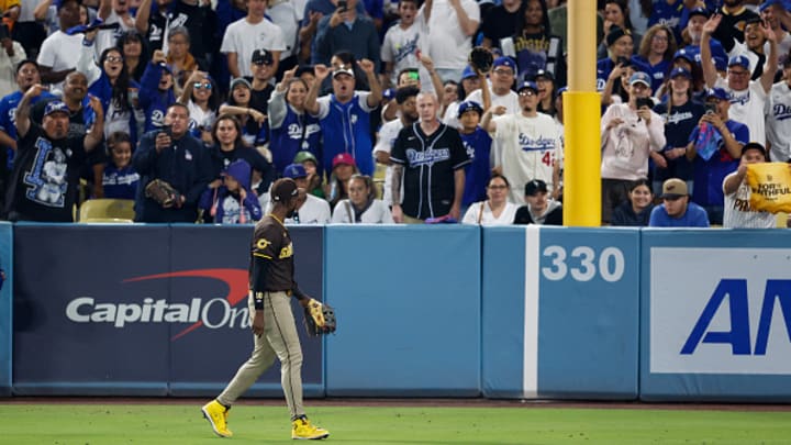 Los Angeles Dodgers fans shout at San Diego Padres outfielder Jurickson Profar. 