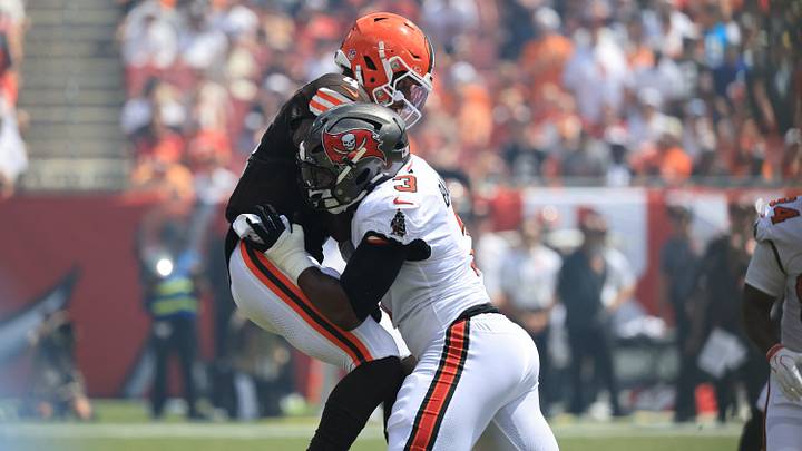 Sep 20, 2026; Tampa, Florida, USA;  Tampa Bay Buccaneers linebacker Rueben Bain Jr. (3) tackles Cleveland Browns quarterback Deshaun Watson (4) during the first quarter at Raymond James Stadium.  Mandatory Credit: Kim Klement Neitzel-Imagn Images