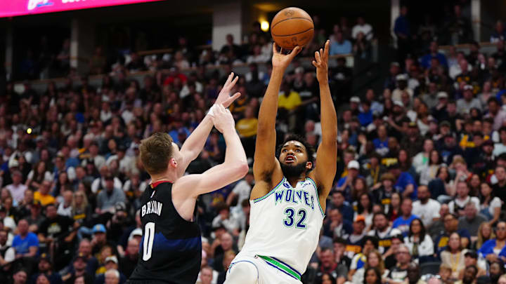 May 19, 2024; Denver, Colorado, USA; Minnesota Timberwolves center Karl-Anthony Towns (32) shoots