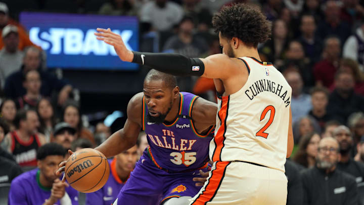 Dec 21, 2024; Phoenix, Arizona, USA; Phoenix Suns forward Kevin Durant (35) drives against Detroit Pistons guard Cade Cunningham (2) during the first half at Footprint Center. Mandatory Credit: Joe Camporeale-Imagn Images Dec 21, 2024; Phoenix, Arizona, USA; Phoenix Suns forward Kevin Durant (35) drives against Detroit Pistons guard Cade Cunningham (2) during the first half at Footprint Center. Mandatory Credit: Joe Camporeale-Imagn Images