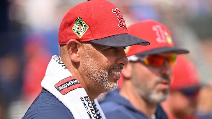 Feb 27, 2026; North Port, Florida, USA; Boston Red Sox manager Alex Cora (13) looks on in the first inning against the Atlanta Braves during spring training at CoolToday Park. Mandatory Credit: Jonathan Dyer-Imagn Images