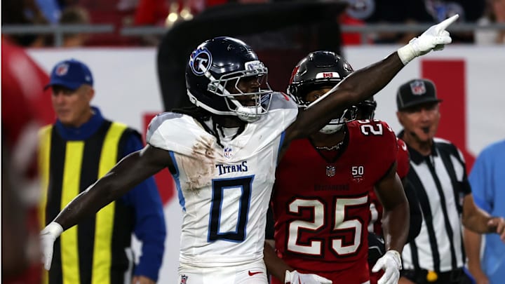 Aug 9, 2025; Tampa, Florida, USA; Tennessee Titans wide receiver Calvin Ridley (0) celebrates after he receives a first down against the Tampa Bay Buccaneers during the first half at Raymond James Stadium. Mandatory Credit: Kim Klement Neitzel-Imagn Images