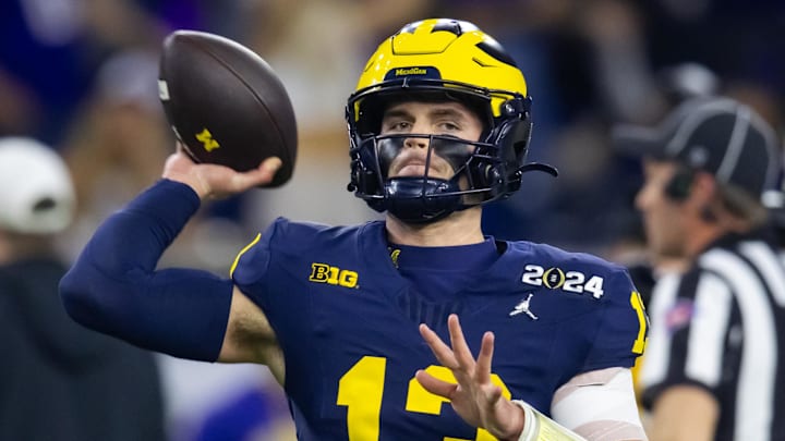 Jan 8, 2024; Houston, TX, USA; Michigan Wolverines quarterback Jack Tuttle (13) against the Washington Huskies during the 2024 College Football Playoff national championship game at NRG Stadium. Mandatory Credit: Mark J. Rebilas-USA TODAY Sports