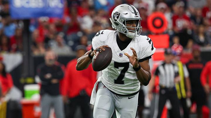 Dec 21, 2025; Houston, Texas, USA; Las Vegas Raiders quarterback Geno Smith (7) drops back to pass against the Houston Texans in the first quarter at NRG Stadium.