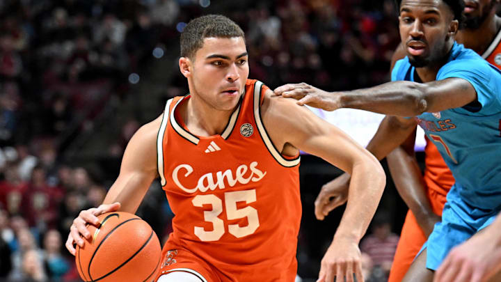 Feb 24, 2026; Tallahassee, Florida, USA; Miami Hurricanes guard Dante Allen (35) drives to the net during the first half against the Florida State Seminoles at Donald L. Tucker Center. Mandatory Credit: Melina Myers-Imagn Images