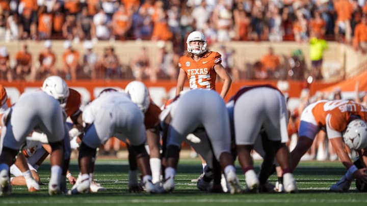 Sep 28, 2024; Austin, Texas, USA;  Texas Longhorns place kicker Bert Auburn (45) looks up before kicking in the second half against the Mississippi State Bulldogs at Darrell K Royal-Texas Memorial Stadium. Mandatory Credit: Daniel Dunn-Imagn Images