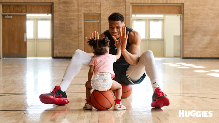 Giannis Antetokounmpo with his daughter, Eva, in a new Huggies campaign. Giannis Antetokounmpo with his daughter, Eva, in a new Huggies campaign.