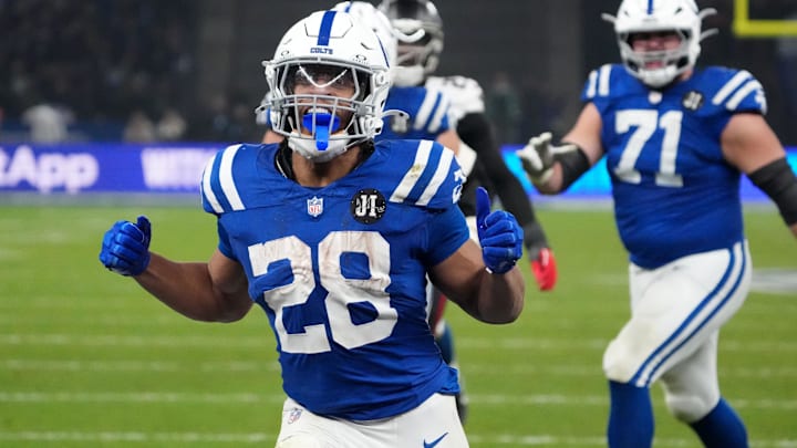 Nov 9, 2025; Berlin, Germany; Indianapolis Colts running back Jonathan Taylor (28) scores the winning touchdown in overtime against the Atlanta Falcons during the NFL Berlin Game at Olympic Stadium. 