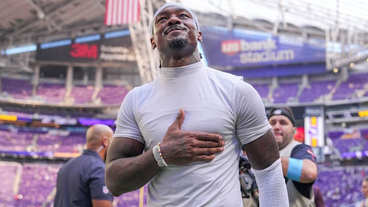 New England Patriots wide receiver Stefon Diggs acknowledges fans after the game against the Minnesota Vikings at U.S. Bank Stadium.