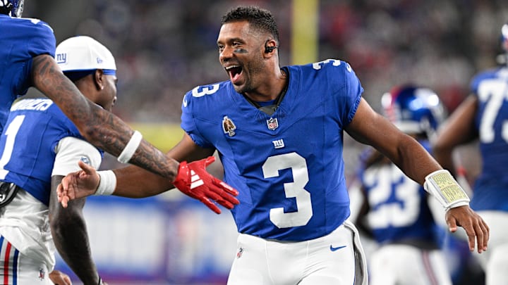 New York Giants QB Russell Wilson celebrates a touchdown during the first quarter against the New England Patriots. New York Giants QB Russell Wilson celebrates a touchdown during the first quarter against the New England Patriots.