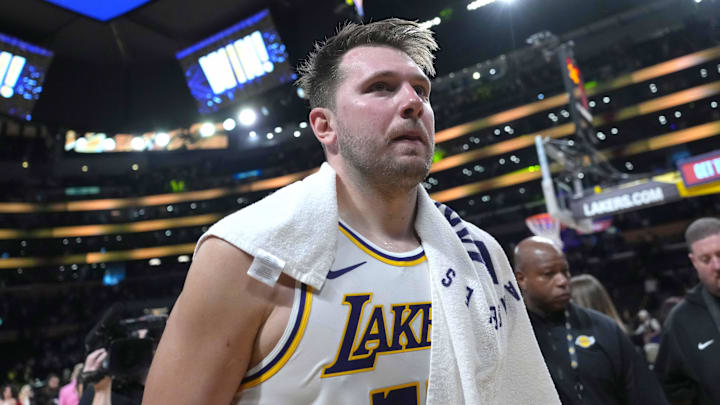 Mar 16, 2025; Los Angeles, California, USA; Los Angeles Lakers guard Luka Doncic (77) reacts after the game against the Phoenix Suns at Crypto.com Arena. Mandatory Credit: Kirby Lee-Imagn Images