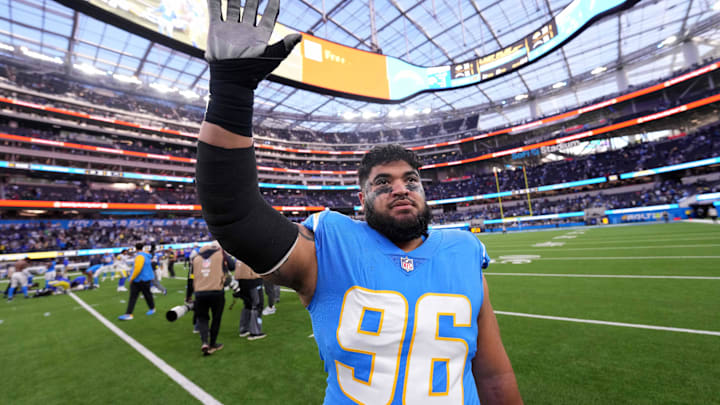 Jan 1, 2023; Inglewood, California, USA; Los Angeles Chargers defensive tackle Breiden Fehoko (96) reacts after the game against the Los Angeles Rams at SoFi Stadium. Mandatory Credit: Kirby Lee-Imagn Images