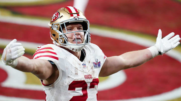 San Francisco 49ers running back Christian McCaffrey (23) celebrates after scoring a touchdown against the Kansas City Chiefs in the first half in Super Bowl LVIII at Allegiant Stadium. 
