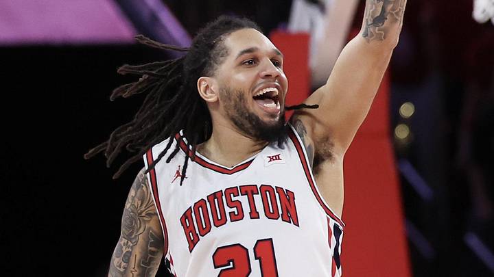 Mar 4, 2026; Houston, Texas, USA; Houston Cougars guard Emanuel Sharp (21) reacts to playing against the Baylor Bears in the second half at Fertitta Center. Mandatory Credit: Thomas Shea-Imagn Images