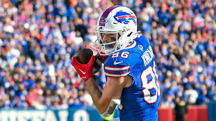 Oct 20, 2024; Orchard Park, New York, USA; Buffalo Bills tight end Dalton Kincaid (86) catches a pass against the Tennessee Titans in the third quarter at Highmark Stadium.