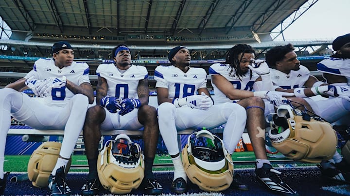 Rylon "Batman" Dillard-Allen (18) takes a break with Tacario Davis (8), Leroy Bryant (0), Makell Esteen (24) and Paul Mencke Jr. (31). Rylon "Batman" Dillard-Allen (18) takes a break with Tacario Davis (8), Leroy Bryant (0), Makell Esteen (24) and Paul Mencke Jr. (31).