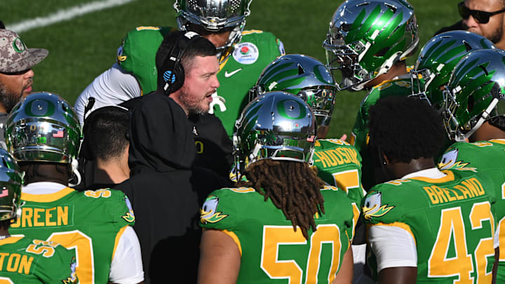 Jan 1, 2025; Pasadena, CA, USA; Oregon Ducks head coach Dan Lanning during a timeout in the first quarter against the Ohio State Buckeyes at Rose Bowl Stadium. Mandatory Credit: Robert Hanashiro-Imagn Images