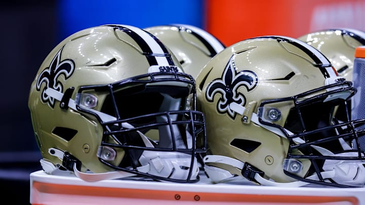 Aug 23, 2021; New Orleans, Louisiana, USA;  New Orleans Saints helmets during the game between the New Orleans Saints and the Jacksonville Jaguars during the first half at Caesars Superdome. Mandatory Credit: Stephen Lew-Imagn Images