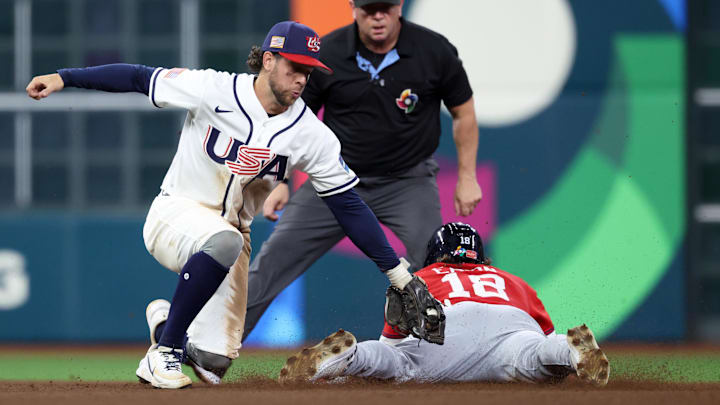 Mar 7, 2026; Houston, TX, United States; United States second baseman Ernie Clement (5) catches Great Britain third baseman Nate Eaton (18) stealing second base during the sixth inning at Daikin Park.