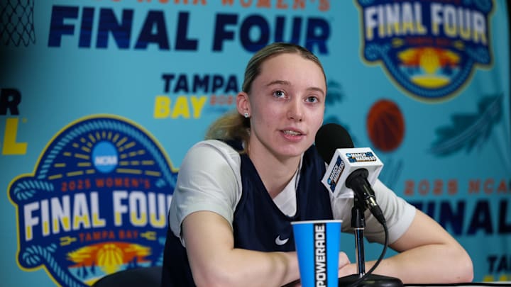 Apr 3, 2025; Tampa, FL, USA; UConn Huskies guard Paige Bueckers (5) talks to media before the NCAA Woman’s Final Four at Amalie Arena. Mandatory Credit: Nathan Ray Seebeck-Imagn Images