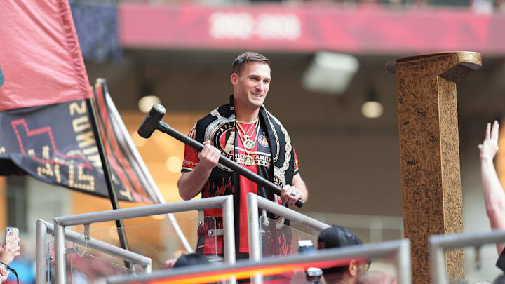 Apr 20, 2024; Atlanta, Georgia, USA; Atlanta Falcons quarterback Kirk Cousins during a pregame ritual before an Atlanta United match against FC Cincinnati at Mercedes-Benz Stadium. Mandatory Credit: Dale Zanine-USA TODAY Sports