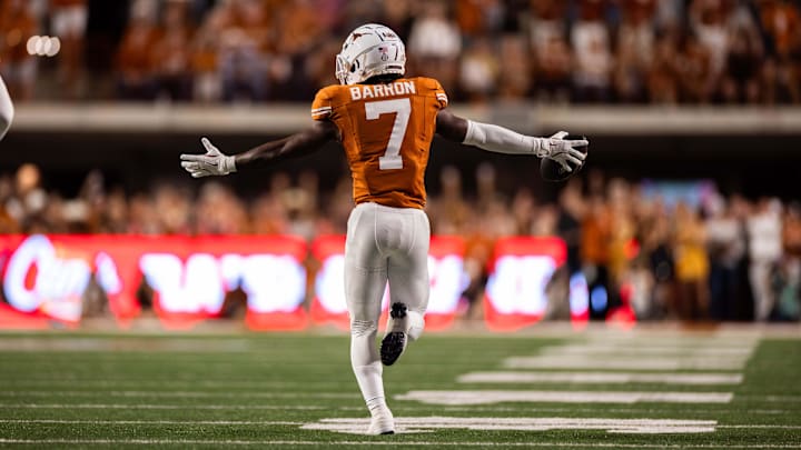 Oct 19, 2024; Austin, Texas, USA; Texas Longhorns cornerback Jahdae Barron (7) celebrates an interception in the first quarter against the Georgia Bulldogs at Darrell K Royal-Texas Memorial Stadium. Mandatory Credit: Brett Patzke-Imagn Images