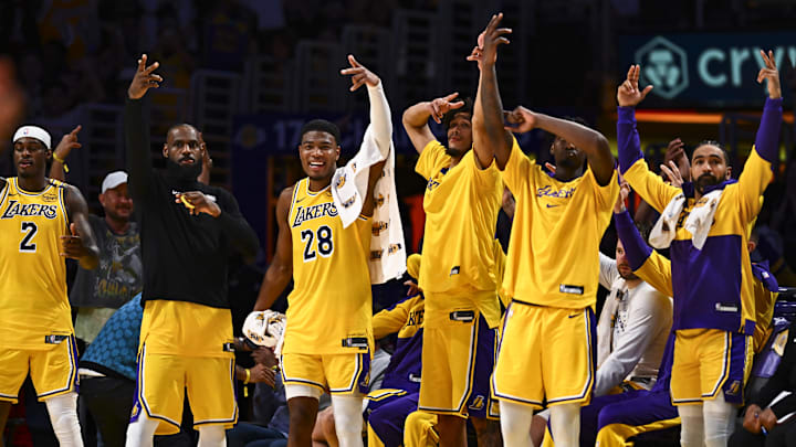 Apr 11, 2025; Los Angeles, California, USA; Los Angeles Lakers forward Jarred Vanderbilt (2), forward LeBron James (23), forward Rui Hachimura (28), center Jaxson Hayes (11), and Los Angeles Lakers guard Gabe Vincent (7) celebrate after scoring against the Houston Rockets during the second half at Crypto.com Arena. Mandatory Credit: Jonathan Hui-Imagn Images