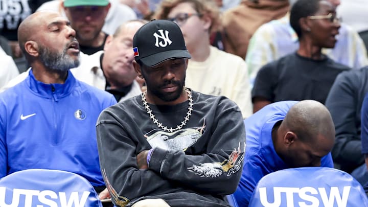 Mar 16, 2025; Dallas, Texas, USA; Dallas Mavericks guard Kyrie Irving sits on the bench against the Philadelphia 76ers during the first half at American Airlines Center. Mandatory Credit: Kevin Jairaj-Imagn Images Mar 16, 2025; Dallas, Texas, USA; Dallas Mavericks guard Kyrie Irving sits on the bench against the Philadelphia 76ers during the first half at American Airlines Center. Mandatory Credit: Kevin Jairaj-Imagn Images