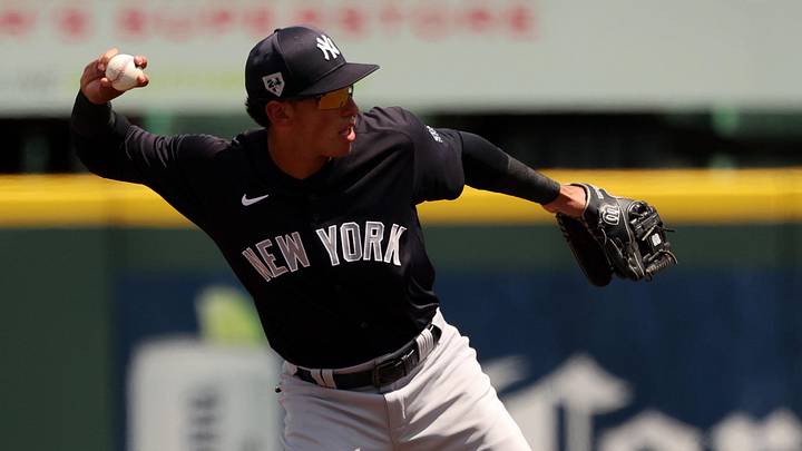 Mar 24, 2024; Bradenton, Florida, USA; New York Yankees infielder George Lombard Jr. (18) throws the ball to first base for an out during the fourth inning against the Pittsburgh Pirates at LECOM Park. Mandatory Credit: Kim Klement Neitzel-Imagn Images Mar 24, 2024; Bradenton, Florida, USA; New York Yankees infielder George Lombard Jr. (18) throws the ball to first base for an out during the fourth inning against the Pittsburgh Pirates at LECOM Park. Mandatory Credit: Kim Klement Neitzel-Imagn Images
