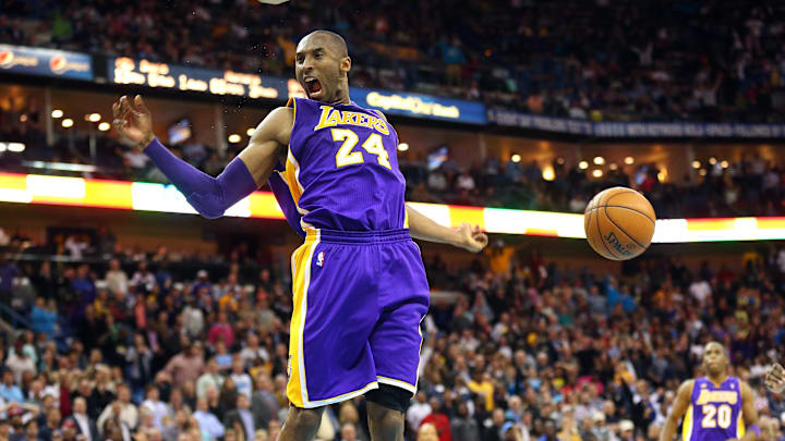 Mar 6, 2013; New Orleans, LA, USA; Los Angeles Lakers guard Kobe Bryant (24) reacts after dunking the ball against the New Orleans Hornets 